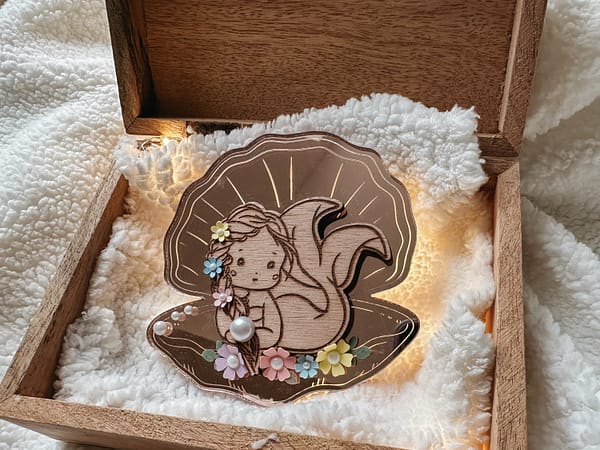 Coquillage Miroir avec sa sirène